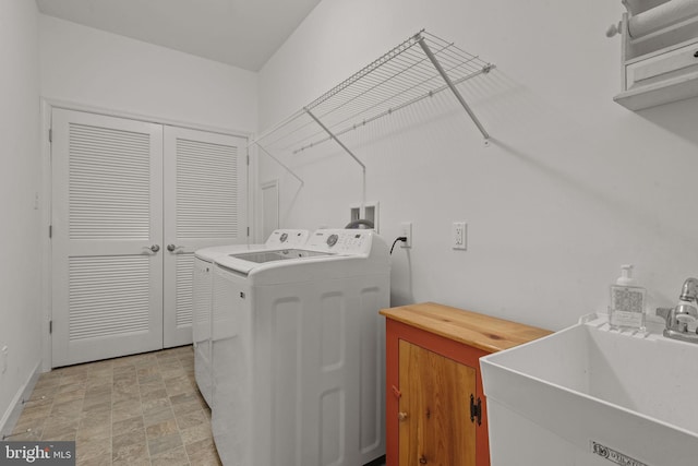 612 Cypress Dr Unit 51, Hanover, PA 17331 - washroom with washing machine and clothes dryer and stone finish floors