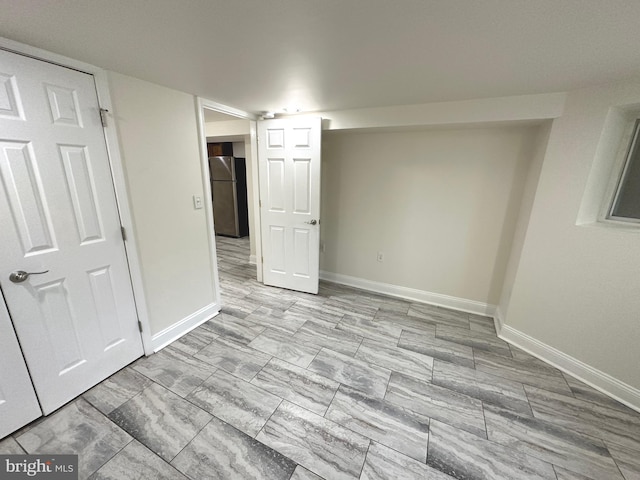 75 New York Ave NW, Washington, DC 20001 - finished below grade area featuring freestanding refrigerator and baseboards