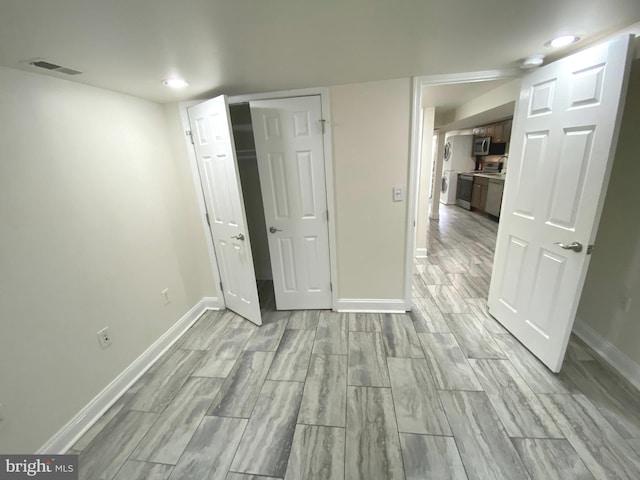 75 New York Ave NW, Washington, DC 20001 - unfurnished bedroom with wood finished floors, recessed lighting, and a closet