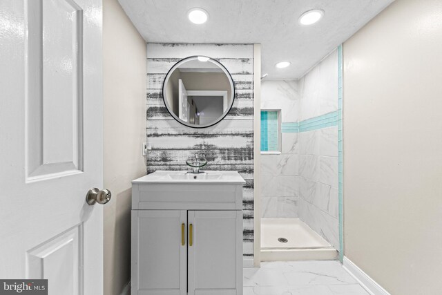 8 Cross Falls Cir, Sparks Glencoe, MD 21152 - bathroom with vanity, marble finish floors, a tile shower, and recessed lighting