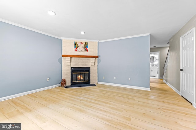 8 Cross Falls Cir, Sparks Glencoe, MD 21152 - unfurnished living room featuring ornamental molding, a brick fireplace, wood finished floors, and recessed lighting
