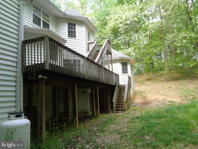 4365 Family Cir, Prince Frederick, MD 20678 - view of side of home with stairway and a wooden deck