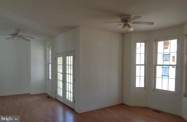 4365 Family Cir, Prince Frederick, MD 20678 - spare room with ceiling fan and wood finished floors