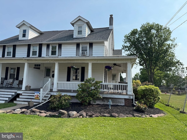 420 Wile Ave, Souderton, PA 18964 - farmhouse-style home with a porch, ceiling fan, roof with shingles, and a chimney
