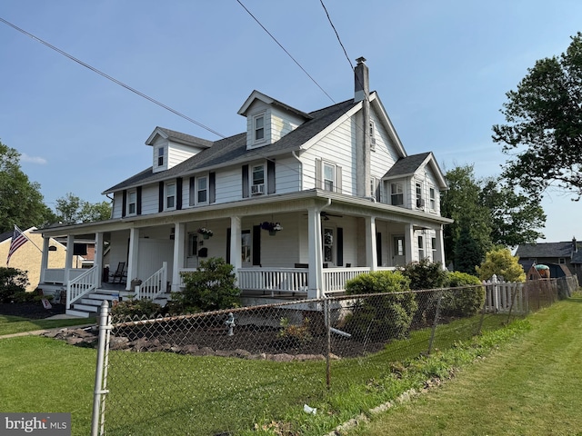 420 Wile Ave, Souderton, PA 18964 - farmhouse inspired home with covered porch, a fenced front yard, and a chimney