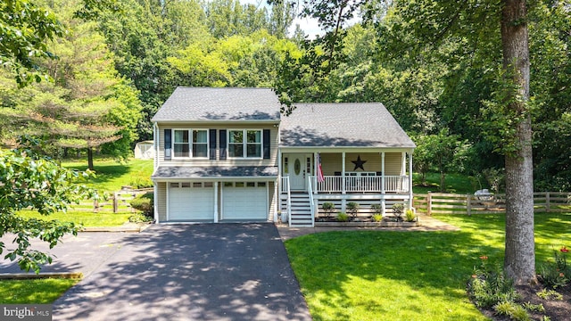 6444 Duhollow Rd, Warrenton, VA 20187 - view of front of house featuring a porch, asphalt driveway, a garage, and roof with shingles