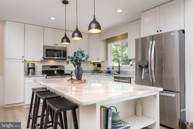 6444 Duhollow Rd, Warrenton, VA 20187 - kitchen featuring stainless steel appliances, open shelves, white cabinets, decorative backsplash, and light stone counters