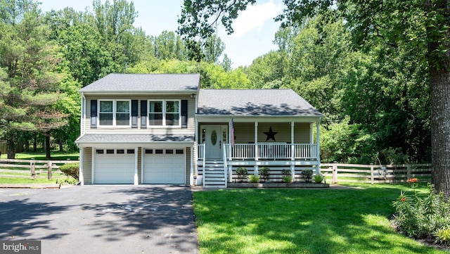 6444 Duhollow Rd, Warrenton, VA 20187 - tri-level home with driveway, a porch, a garage, and a shingled roof