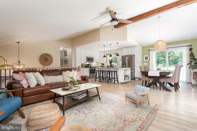6444 Duhollow Rd, Warrenton, VA 20187 - living area with a ceiling fan, beamed ceiling, light wood-style flooring, and high vaulted ceiling