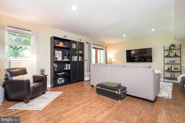 6444 Duhollow Rd, Warrenton, VA 20187 - living room featuring light wood-style floors and recessed lighting