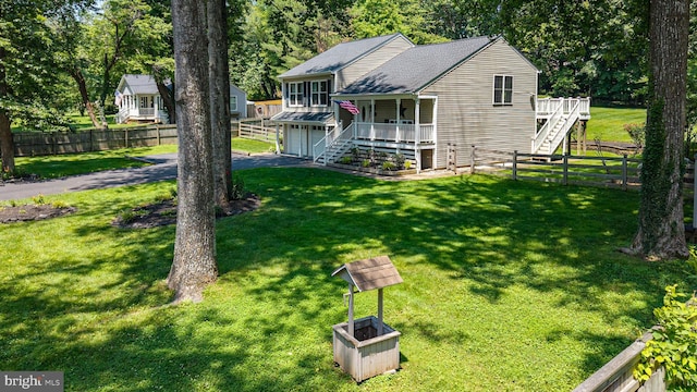 6444 Duhollow Rd, Warrenton, VA 20187 - view of front of home featuring stairway, an attached garage, asphalt driveway, and a porch
