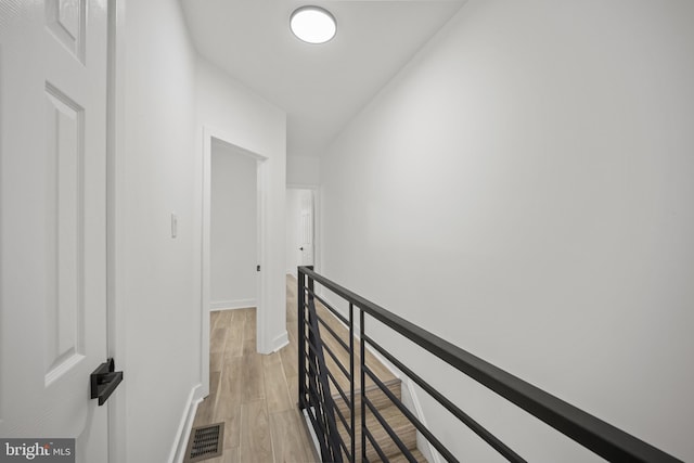 239 Rubicam St, Philadelphia, PA 19120 - hallway featuring an upstairs landing and light wood finished floors
