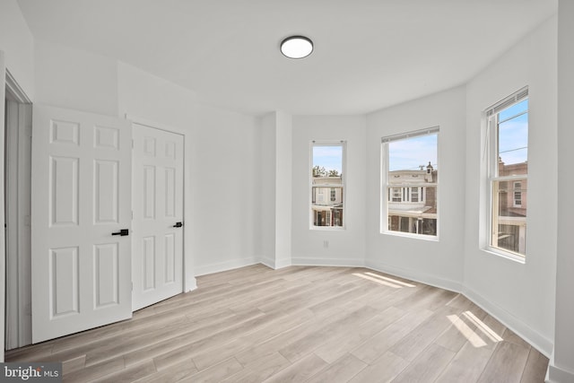 239 Rubicam St, Philadelphia, PA 19120 - unfurnished bedroom with light wood finished floors and baseboards