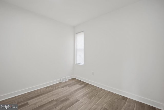 239 Rubicam St, Philadelphia, PA 19120 - unfurnished room with wood finished floors and baseboards