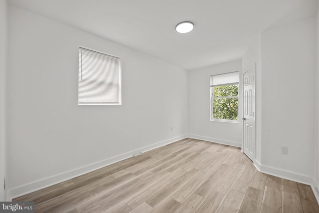 239 Rubicam St, Philadelphia, PA 19120 - empty room with light wood finished floors and baseboards