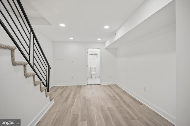 239 Rubicam St, Philadelphia, PA 19120 - below grade area featuring light wood-style flooring, recessed lighting, and stairway