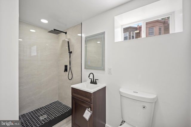 239 Rubicam St, Philadelphia, PA 19120 - bathroom featuring vanity, tiled shower, and recessed lighting
