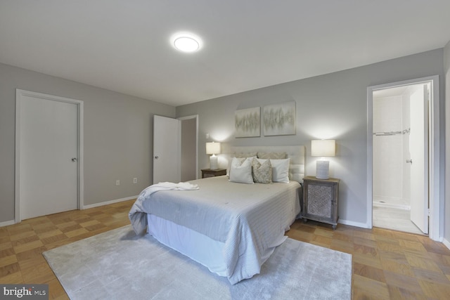 1814 Ivy Oak Sq, Reston, VA 20190 - bedroom featuring baseboards and ensuite bath