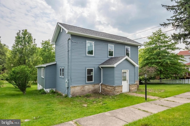 511 E Green St, Oakland, MD 21550 - traditional-style house featuring stone siding and roof with shingles