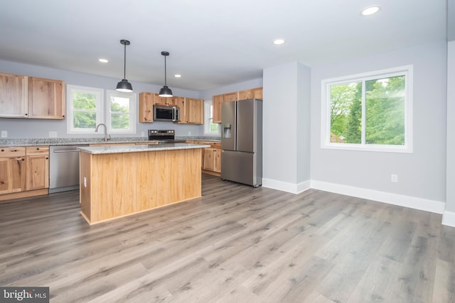 511 E Green St, Oakland, MD 21550 - kitchen featuring stainless steel appliances, recessed lighting, light wood-style flooring, and a kitchen island