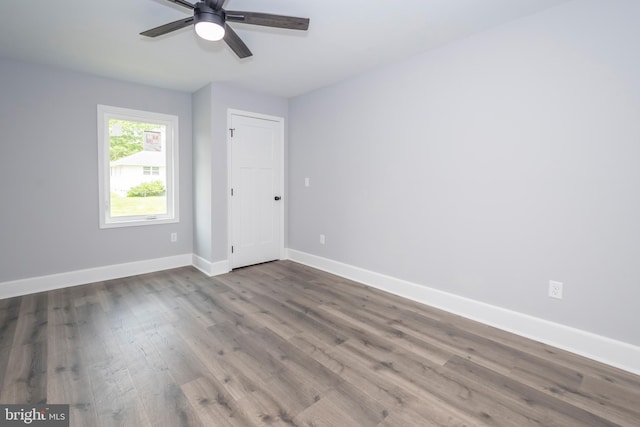 511 E Green St, Oakland, MD 21550 - unfurnished room with wood finished floors and ceiling fan