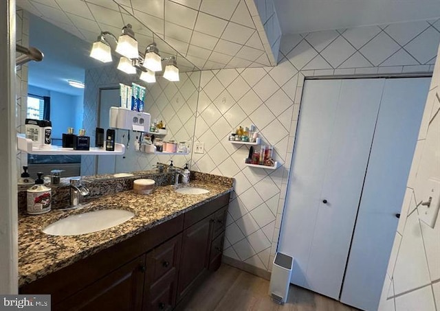 1239 Vermont Ave NW Unit 902, Washington, DC 20005 - full bathroom with wood finished floors and double vanity