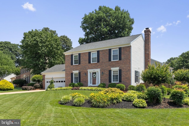 5304 Braddock Ridge Dr, Centreville, VA 20120 - colonial-style house with a garage, a chimney, a front lawn, and brick siding