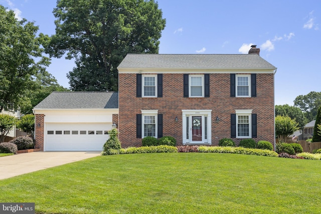5304 Braddock Ridge Dr, Centreville, VA 20120 - colonial inspired home featuring a chimney, a front lawn, a garage, driveway, and brick siding