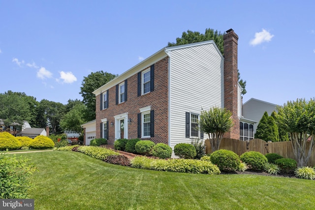 5304 Braddock Ridge Dr, Centreville, VA 20120 - view of home's exterior featuring a chimney and an attached garage