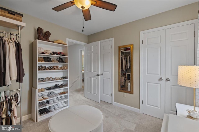 5304 Braddock Ridge Dr, Centreville, VA 20120 - bedroom with light carpet, a ceiling fan, and multiple closets