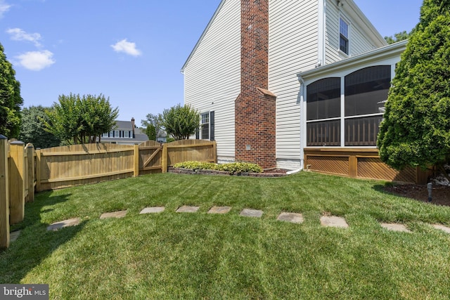 5304 Braddock Ridge Dr, Centreville, VA 20120 - view of yard featuring a gate and a sunroom