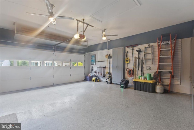 5304 Braddock Ridge Dr, Centreville, VA 20120 - garage with a garage door opener and a ceiling fan
