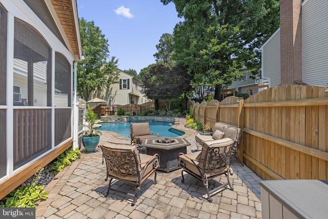 5304 Braddock Ridge Dr, Centreville, VA 20120 - fenced backyard featuring a fire pit, a patio, and a pool with connected hot tub