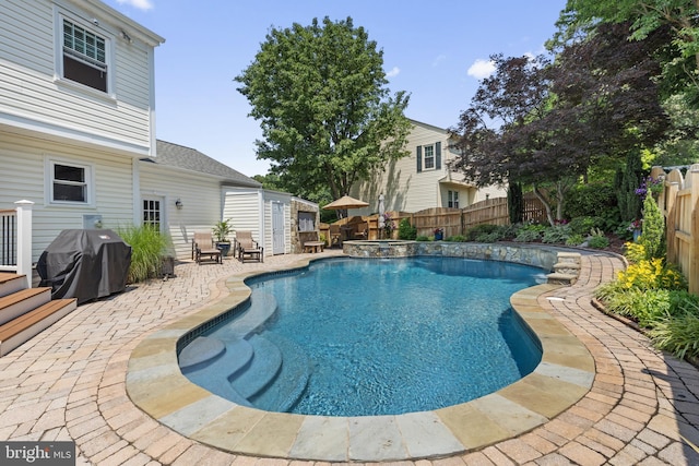5304 Braddock Ridge Dr, Centreville, VA 20120 - view of swimming pool featuring grilling area, a fenced backyard, a patio area, and a pool with connected hot tub