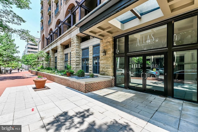 1111 25th St NW Unit 521, Washington, DC 20037 - property entrance with stone siding and french doors