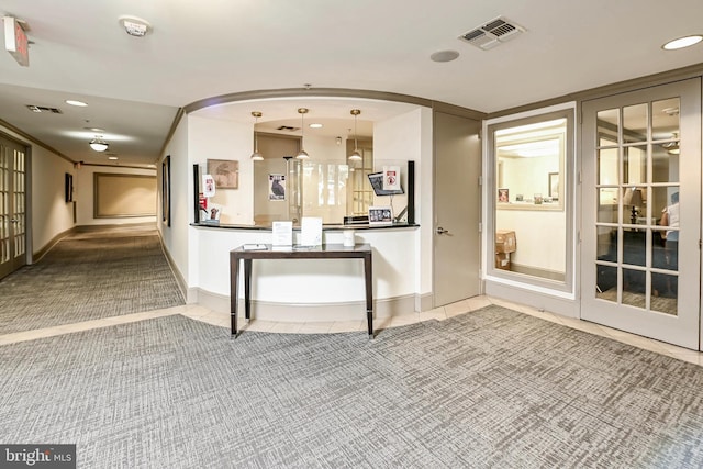 1111 25th St NW Unit 521, Washington, DC 20037 - hallway featuring carpet, recessed lighting, and tile patterned floors