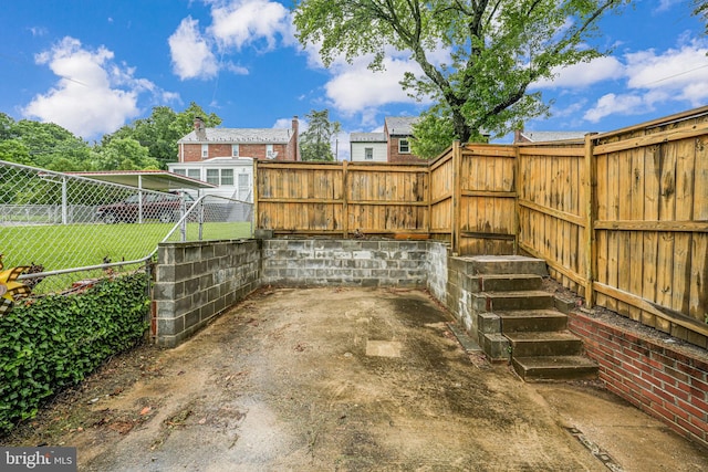 1615 Webster St NE, Washington, DC 20017 - fenced backyard with a patio area