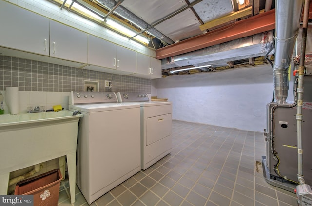 20 Grove Ave, Flourtown, PA 19031 - laundry area featuring separate washer and dryer, cabinet space, and tile patterned flooring