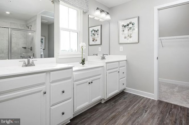 Park Ave Unit Clarendon 4Story, Baltimore, MD 21217 - full bath featuring a shower stall, double vanity, wood finished floors, and a spacious closet