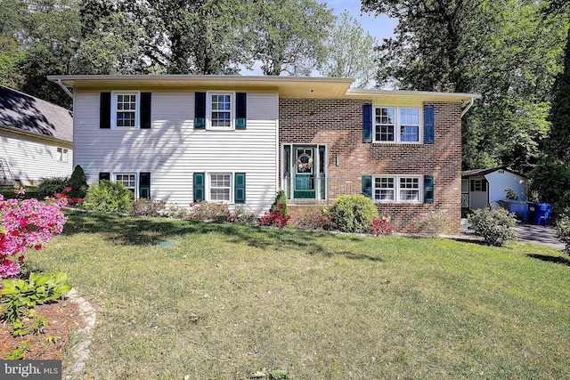 1326 Balsam St, Saint Leonard, MD 20685 - split foyer home featuring a front yard and brick siding