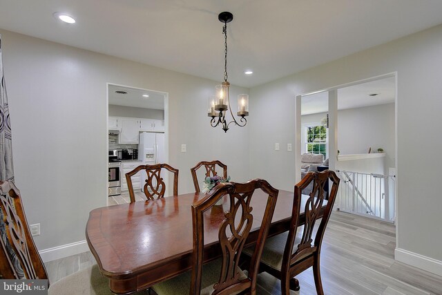 1326 Balsam St, Saint Leonard, MD 20685 - dining area featuring light wood-style floors, recessed lighting, and a chandelier