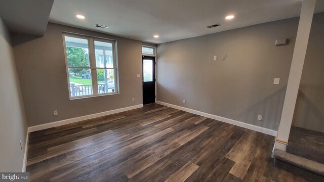 714 Green St, Havre De Grace, MD 21078 - empty room with dark wood-type flooring and recessed lighting