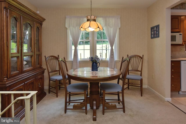 401 Antietam Rd, Reading, PA 19606 - dining space with wallpapered walls and light colored carpet