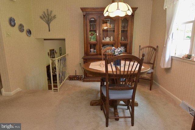 401 Antietam Rd, Reading, PA 19606 - dining space featuring wallpapered walls and light colored carpet