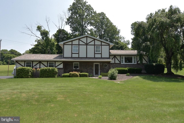 401 Antietam Rd, Reading, PA 19606 - tudor house featuring a front yard