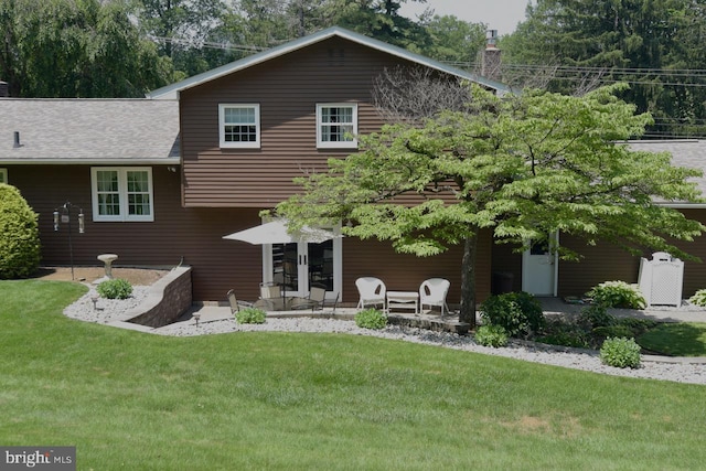 401 Antietam Rd, Reading, PA 19606 - back of property with a lawn and a chimney