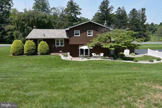 401 Antietam Rd, Reading, PA 19606 - back of property featuring a patio area and a chimney