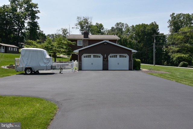 401 Antietam Rd, Reading, PA 19606 - view of front of property with driveway, a chimney, and brick siding