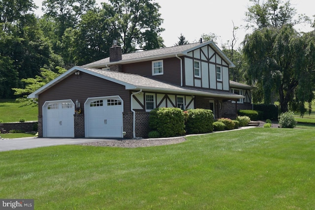 401 Antietam Rd, Reading, PA 19606 - view of front of home with a garage, a front lawn, driveway, and brick siding