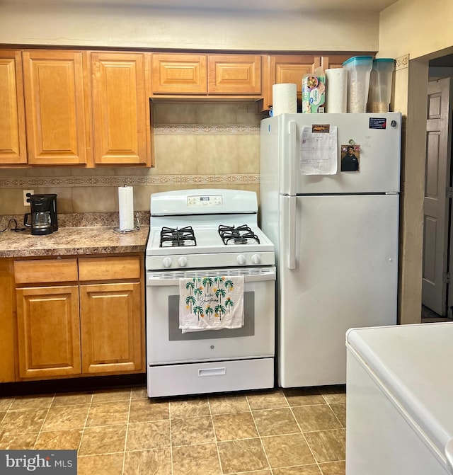 2817 Boyd St, Pennsauken, NJ 08110 - kitchen with white appliances and brown cabinets